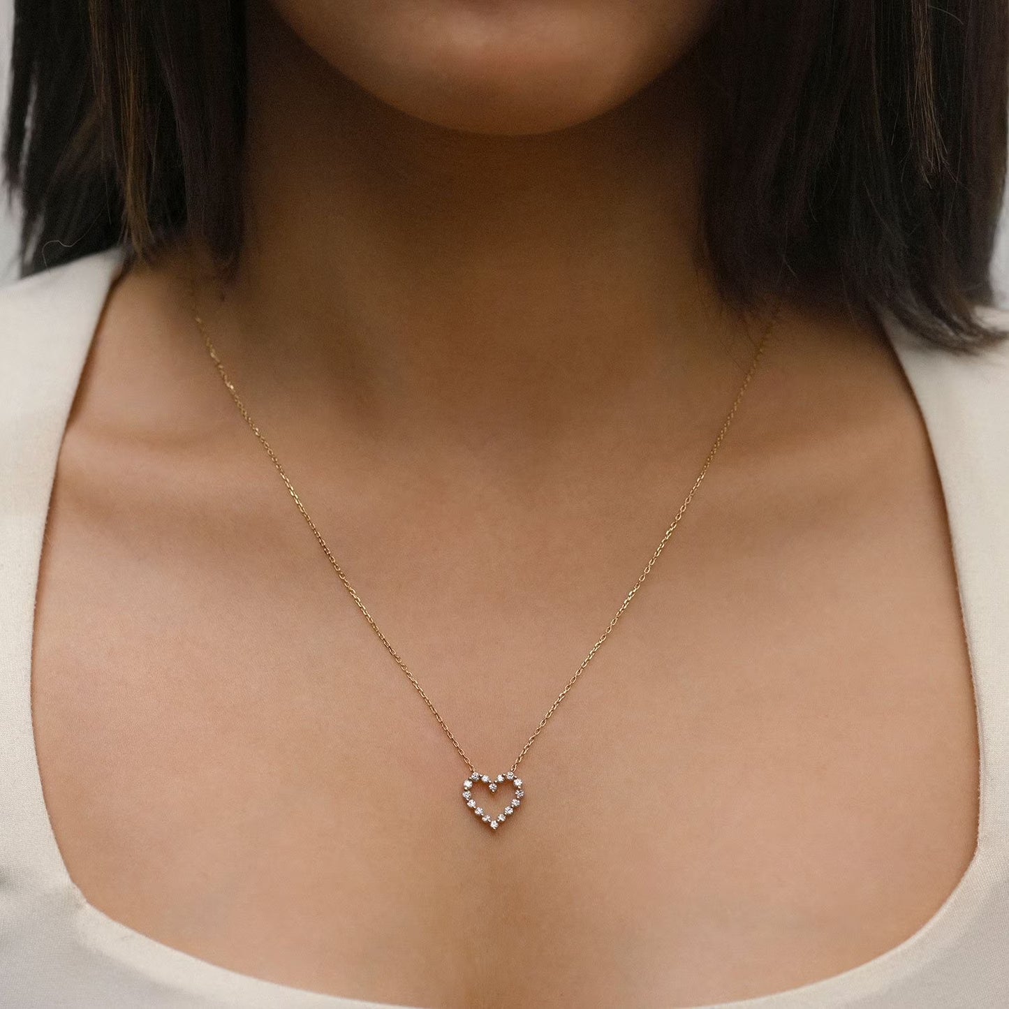 0.23 CT. T.W. Round Cut Heart Shaped Diamond Pendant Necklace