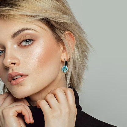 Blue and White Topaz Dangle Earrings in Sterling Silver